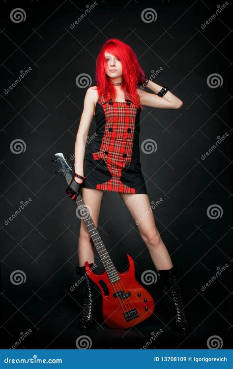 Redhead Rocker Girl with Red Bass Guitar Stock Image - Image of alternative, empty: 13708109