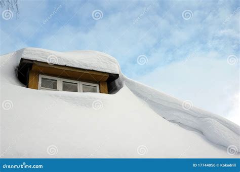 Snow on the roof at winter stock photo. Image of light - 17744056