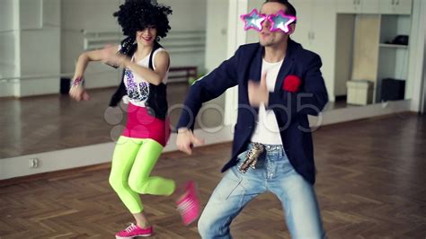 Couple dancing funky, funny dance in ballroom, steadicam shot HD Stock ...