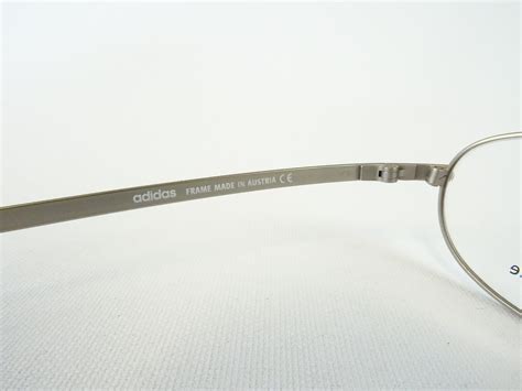 Mattgoldene Sportbrille für kleine Gesichter Adidas leicht und stabil