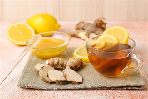 Tea Honey Lemon And Ginger On Beige Textured Table Stock Image