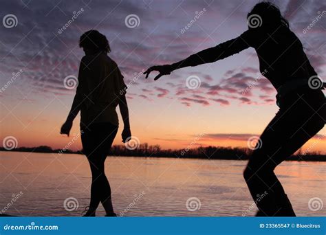 Silhouettes Walking Against Sunset Stock Image Image Of Sunset Body