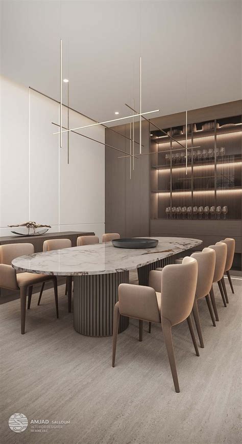 A Large Dining Table Surrounded By Beige Chairs