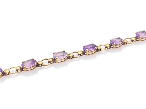 Lot 10K YELLOW GOLD AMETHYST BRACELET