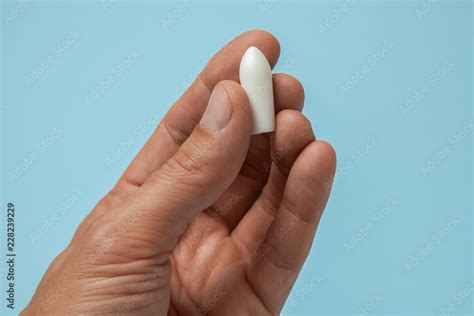 Suppository For Anal Or Vaginal Use In The Hands Of A Man Candles For