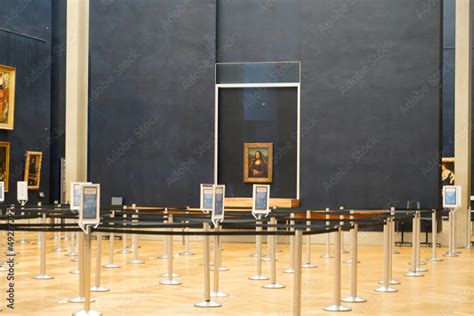 The famous Mona Lisa painting by Leonardo Da Vinci is protected by a ...