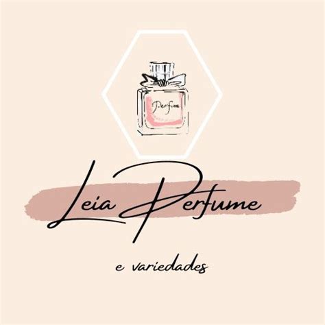 A Bottle Of Perfume On Top Of A Pink Background