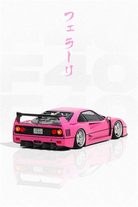 A Pink Sports Car With Japanese Writing On The Back And Side Wall