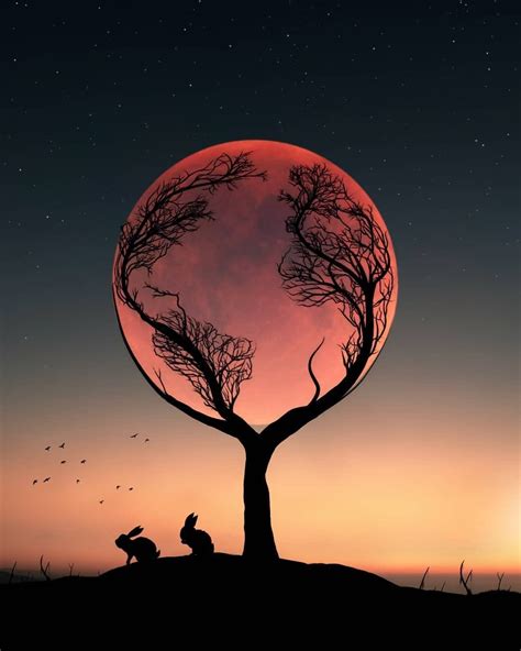 Two People Sitting Under A Tree With The Moon In The Background