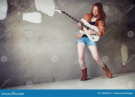 Young Red-haired Girl with an Electric Guitar. Rock Musician Gir Stock Image - Image of legs ...