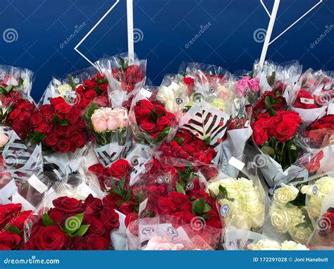 Several Bouquets Of Various Flowers At A Grocery Store Editorial Stock