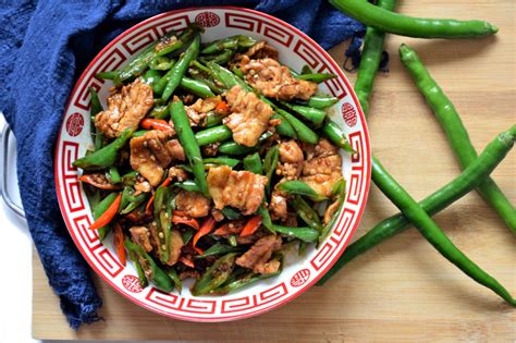 Thinly Sliced Pork Belly And Pork Loin Are Stir Fried With Green