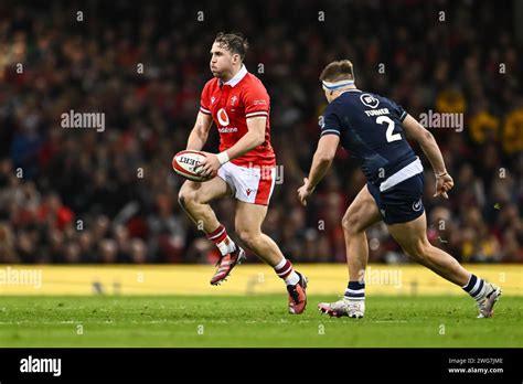 Ioan Lloyd of Wales makes a break during the 2024 Guinness 6 Nations ...