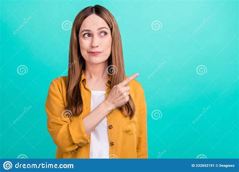 Photo Of Funny Doubtful Mature Lady Wear Yellow Shirt Looking Pointing