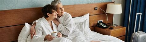 Loving Senior Lesbian Couple Enjoys A Stock Photo Image Of Loving Affection