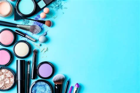 Premium Photo | Collection of makeup products displayed on blue background