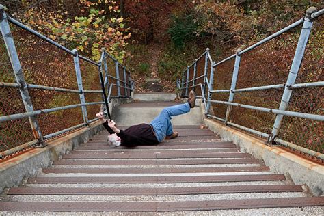 Man Falling Down Stairs Stock Photos Pictures And Royalty Free Images