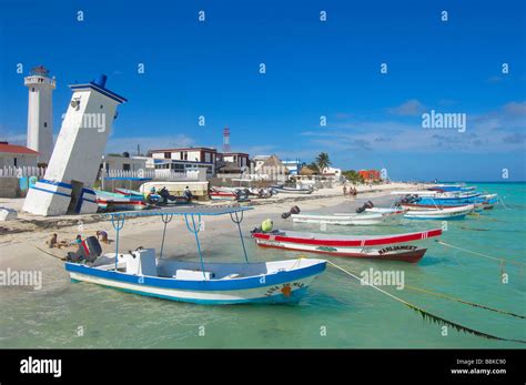 Fishing Boats And Ligthouses At Puerto Morelos Caribe Quintana Roo