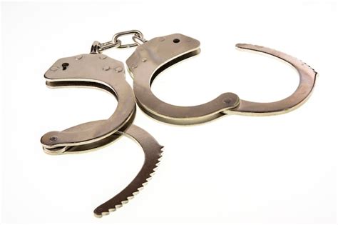 Premium Photo Metal Handcuffs Isolated On The White Background