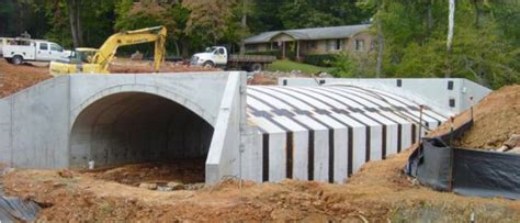 Constructing A Culvert Through The Roadway Unearthing