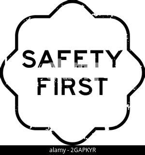 Grunge Black Safety First Word Rubber Seal Stamp On White Background