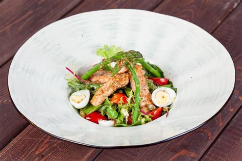 Fresh and Bright, Fish Salad from Various and Appetizing Vegetables