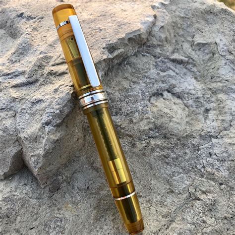 Amber demonstrator pen | The International Association of Penturners