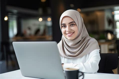 Portrait of Beautiful Muslim Female Student Online Learning in Coffee