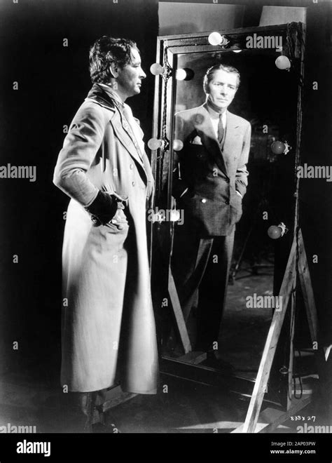 Ronald Colman As Sydney Carton Looks At Reflection In Mirror Of Himself