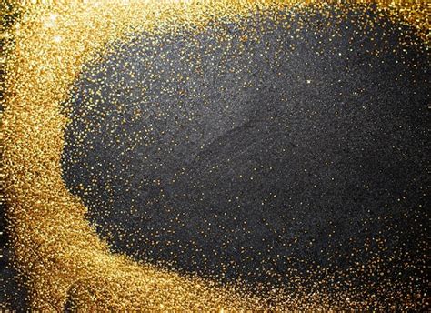 Premium AI Image A Black Background With Gold Glitter And Black Glitter