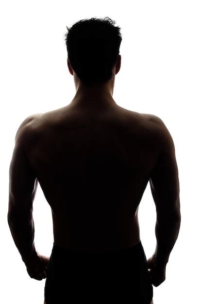 La Espalda Del Hombre Musculoso En Silueta Foto Premium