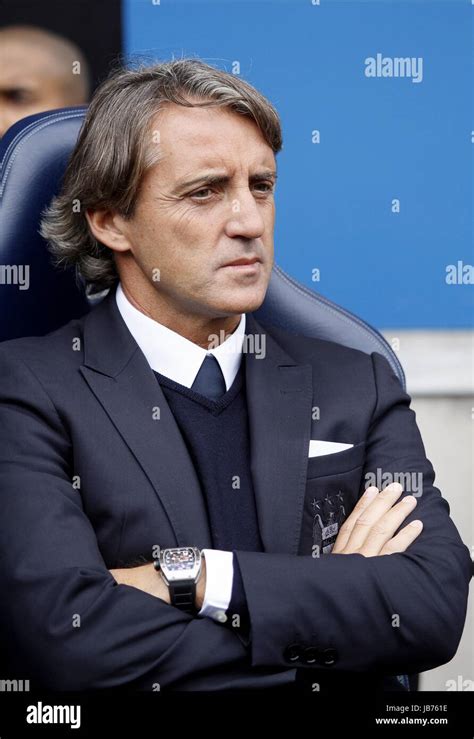 ROBERTO MANCINI MANCHESTER CITY FC MANAGER MANCHESTER CITY FC MANAGER