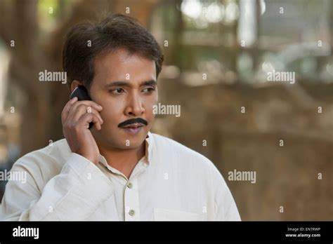 Man Talking On A Mobile Phone Stock Photo Alamy