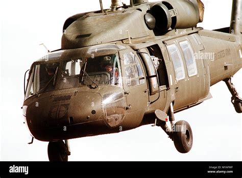 A left front view of a UH-60 Blackhawk (Black Hawk) helicopter during ...