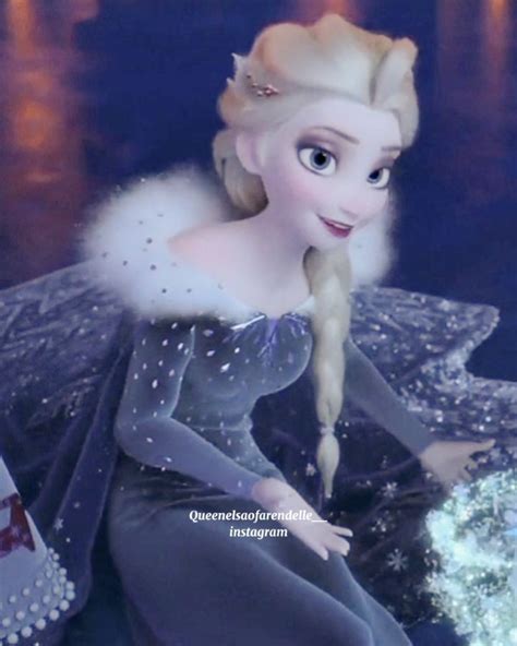 A Frozen Princess Sitting On Top Of A Rock Next To A Body Of Water With Lights In The Background