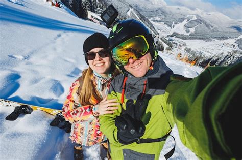 Premium Photo Photo Of A Couple In Love At A Snowy Ski Resort Winter