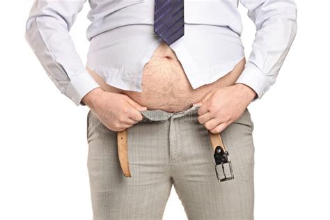 Overweight Man Trying To Fasten Too Small Clothes Stock Image - Image of adult, background: 19292057