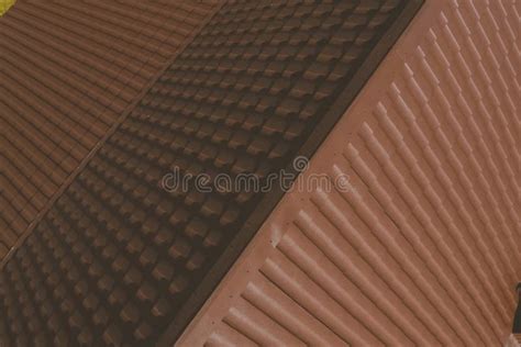 Brown Metal Tile On The Roof Of The House Corrugated Metal Roof And