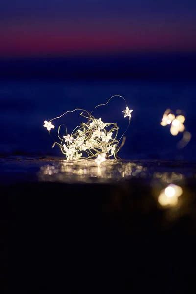 Christmas lights beach Stock Photos, Royalty Free Christmas lights ...