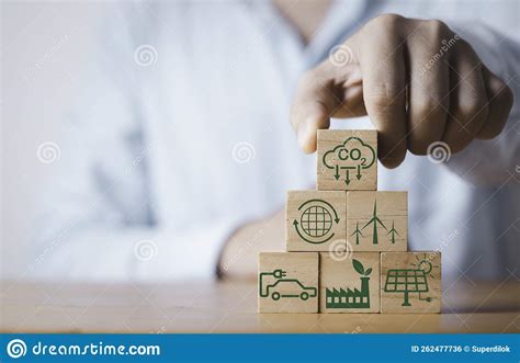 Businessman Stacking CO2 Reducing Recycle Green Factory Icon For