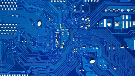 Blue Printed Circuit Board Background Del Colaborador De Stocksy