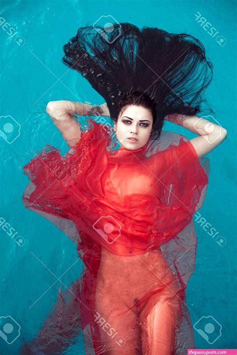 Sexy Naked Seductive Woman Wearing Red Transparent Dress In Swimming