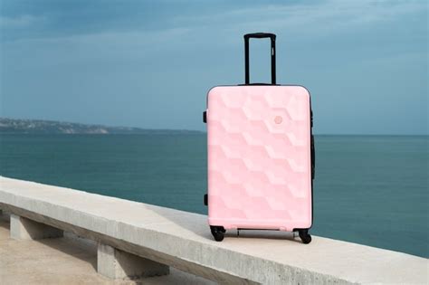 Free Photo | Suitcase with wheels outdoors