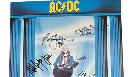 AC/DC Signed 'Who Made Who' Vinyl LP - CharityStars