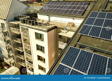 Aerial View Of Solar Photovoltaic Panels On A Roof Top Of Residential