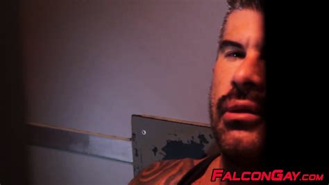 Two Horny Guys Blowing Each Others Dicks Through Glory Hole