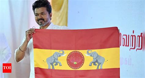 actor vijay unveils tvk flag    colour  emblem signify