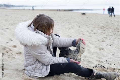 Women Taking Off Boots