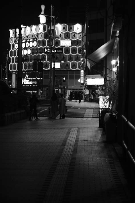 Illuminated Sidewalk in the Dark Night · Free Stock Photo