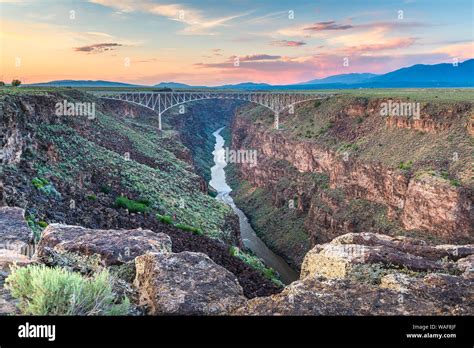 Taos, New Mexico, USA at Rio Grande Gorge Bridge over the Rio Grande at dusk Stock Photo - Alamy